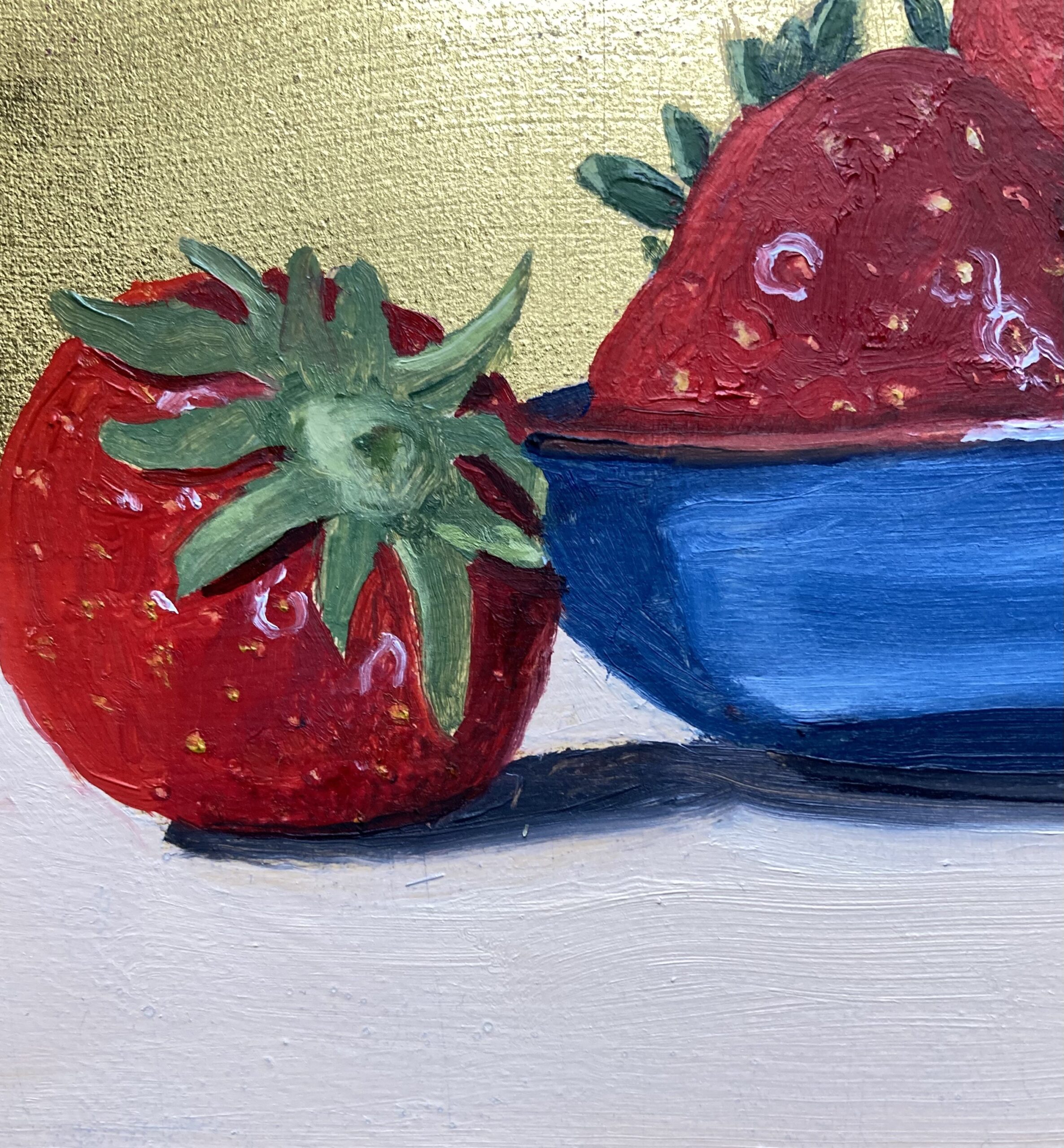 Close up of a section of an oil painting on gold showing strawberries in a blue bowl