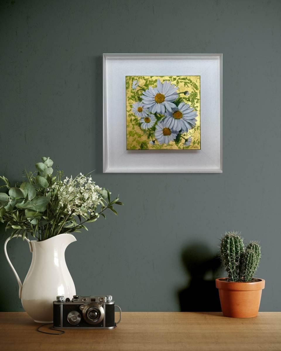 A photo showing an oil painting - Dizzy Daisies on Gold - in a room